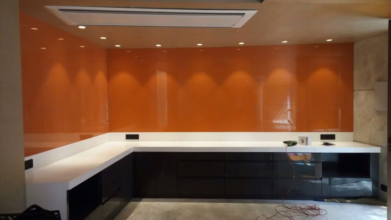 Frameless glass partition in a Kochi interior by GlassWorld Kerala