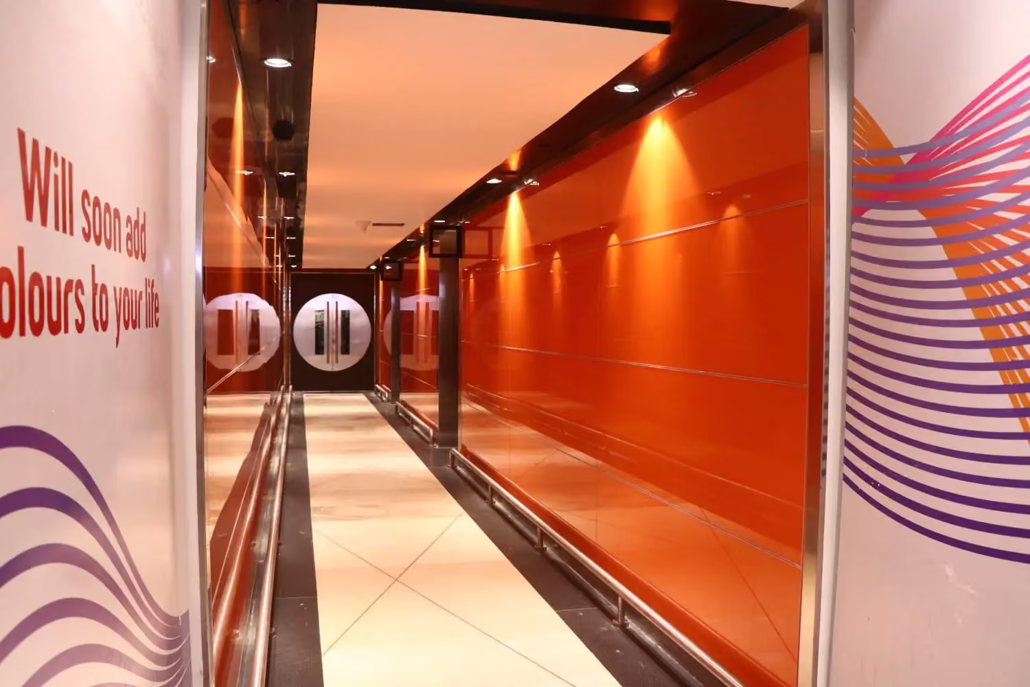 Frameless glass partition in a Kochi corporate interior