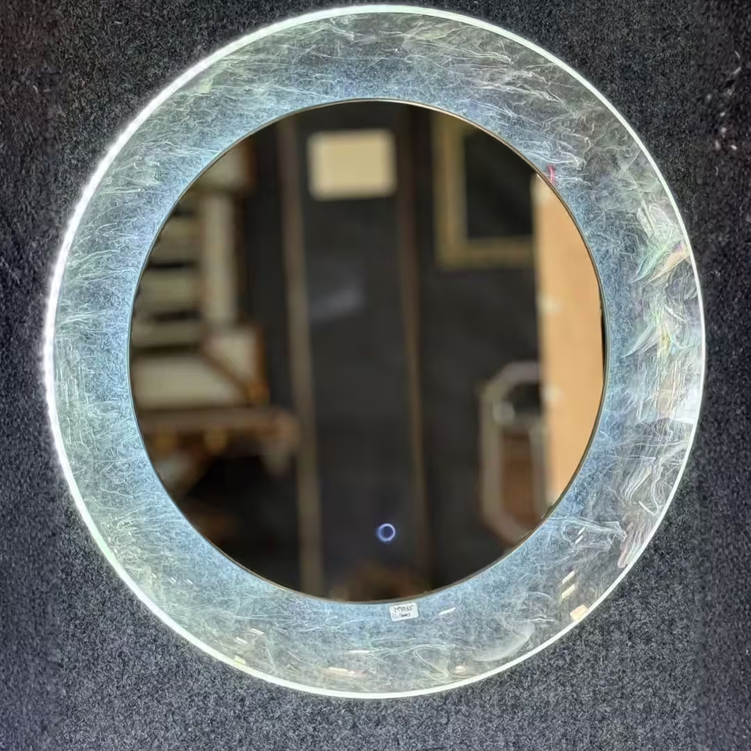 Round LED bathroom vanity mirror by GlassWorld Kerala
